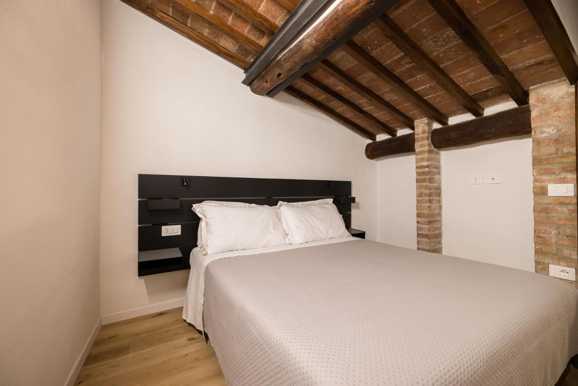 Appartamento Sui Tetti Di Ovile Siena Exterior foto